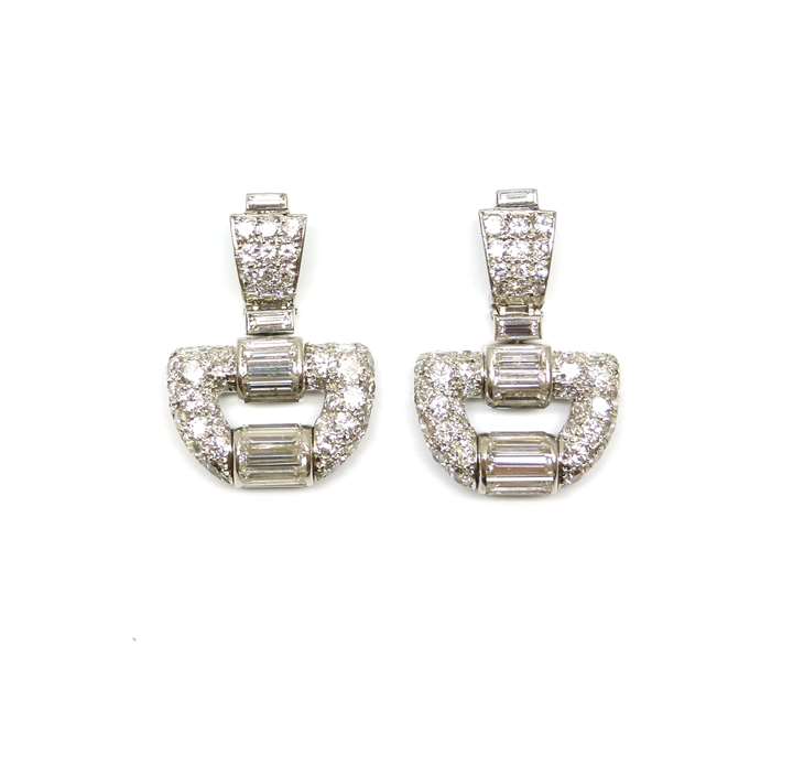 Pair of diamond buckle motif pendant earrings, Cartier Paris,